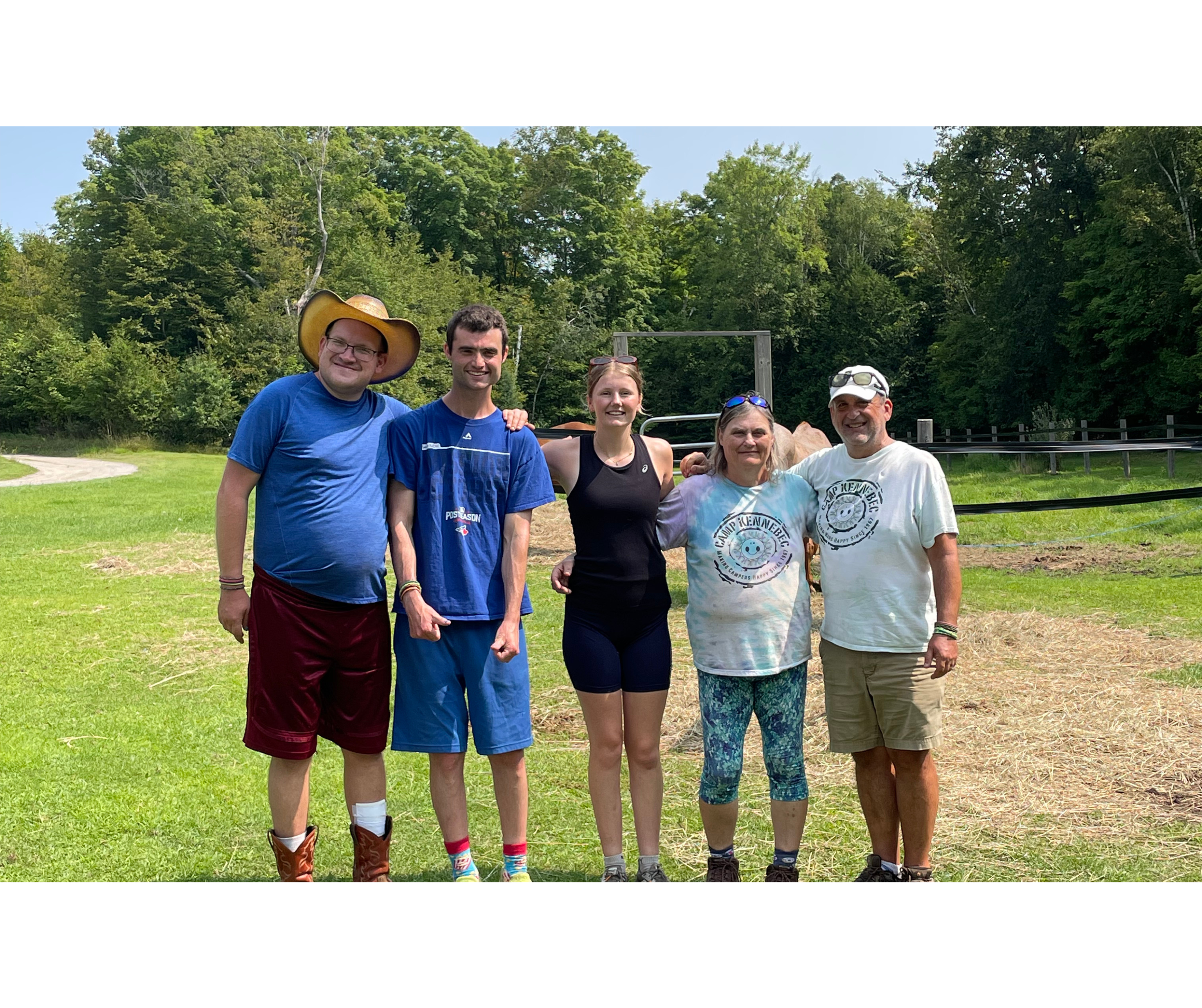 jay posing with horse staff and campers